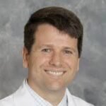 Dr. Peter E. Bloom