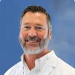 Dr. Phillip E. Dowd