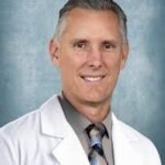 Dr. John V. Spence