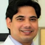 Dr. Raja Tiwari